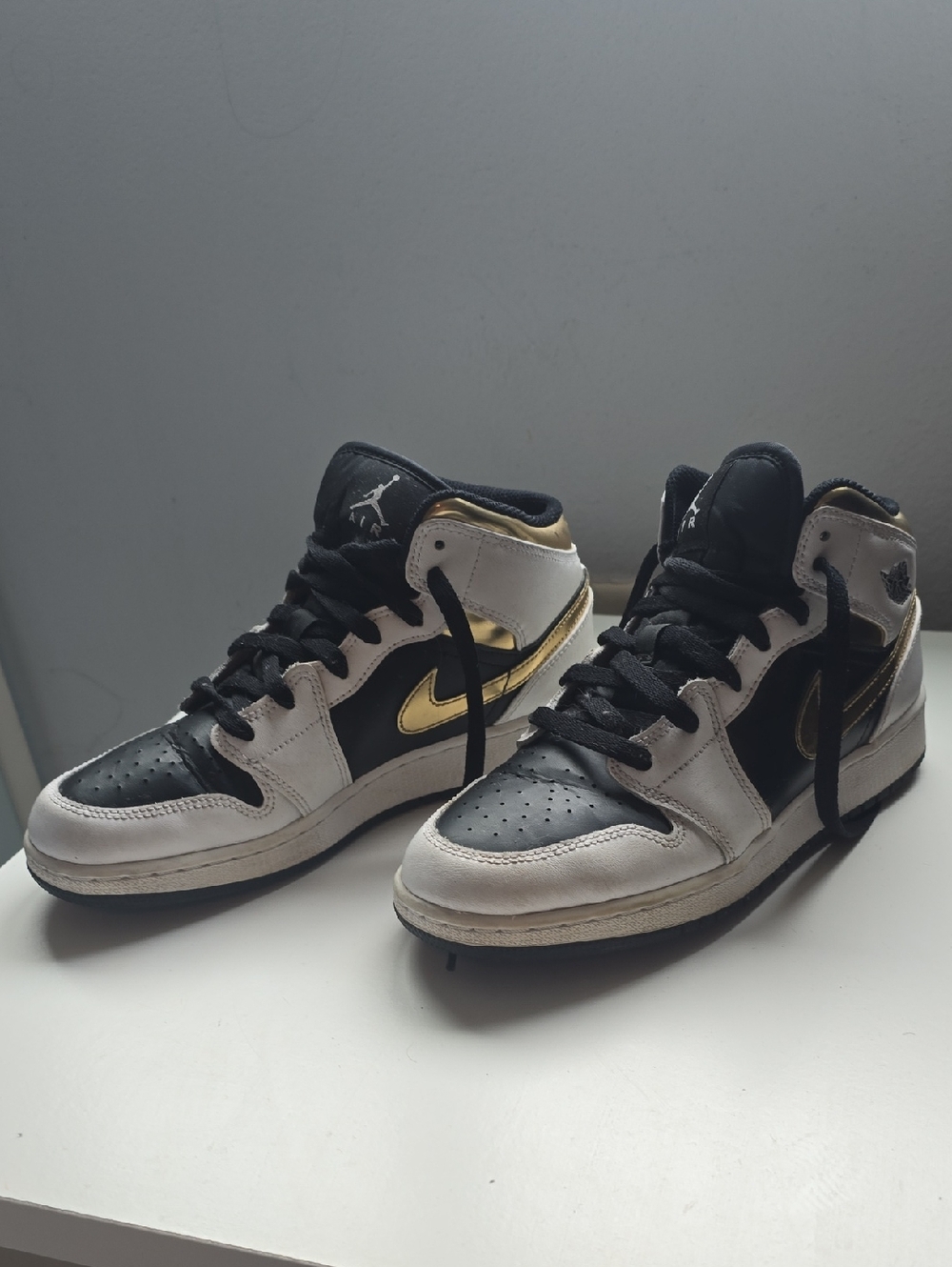 Nike Mid-Top Sneakers in Black, White and Gold
